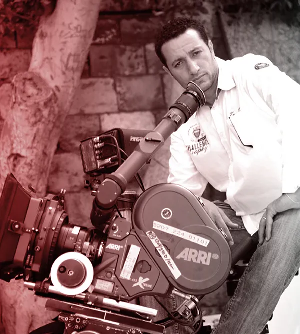 Waleed Nassif behind an ARRI 35 mm film camera
