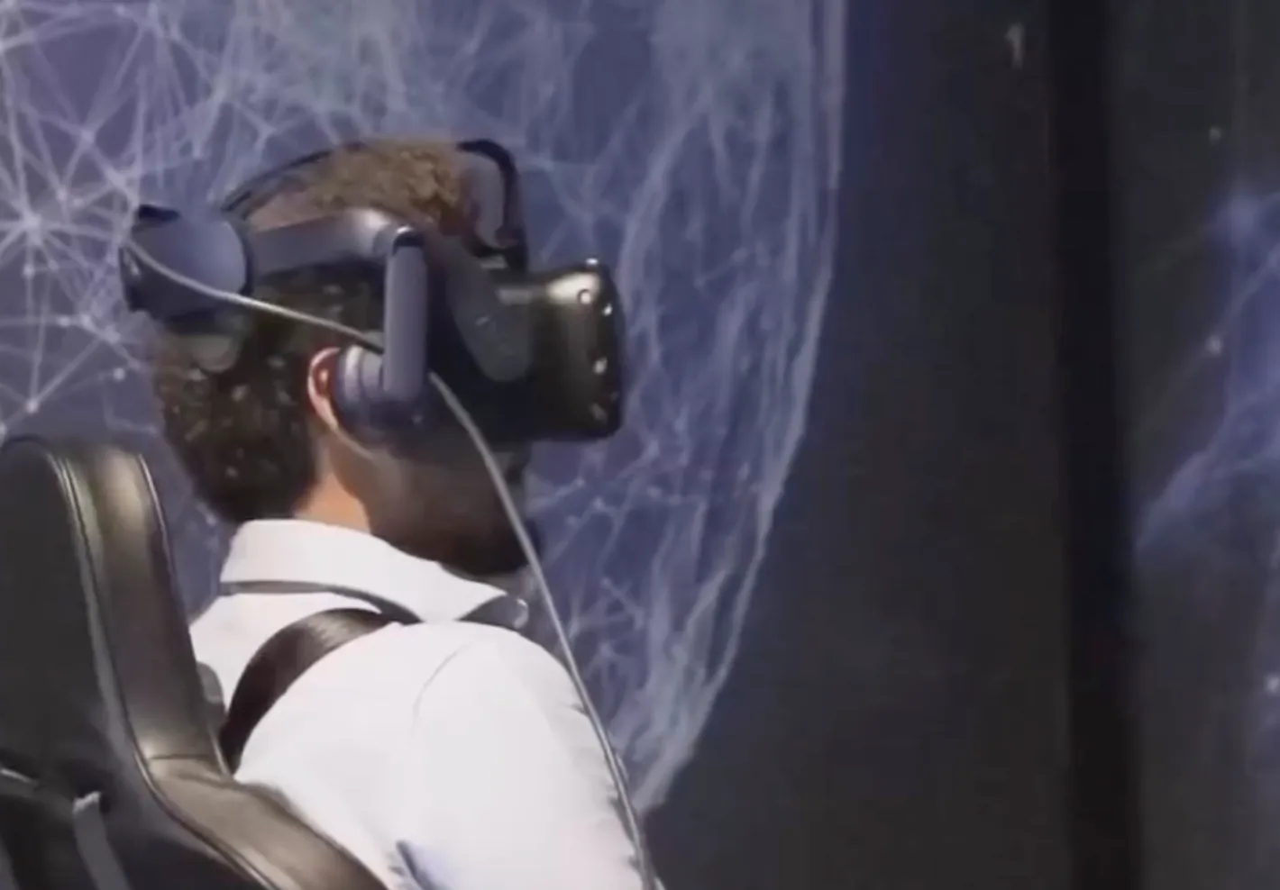 Visitor in a VR headset at a UAE 2071 virtual reality experience
