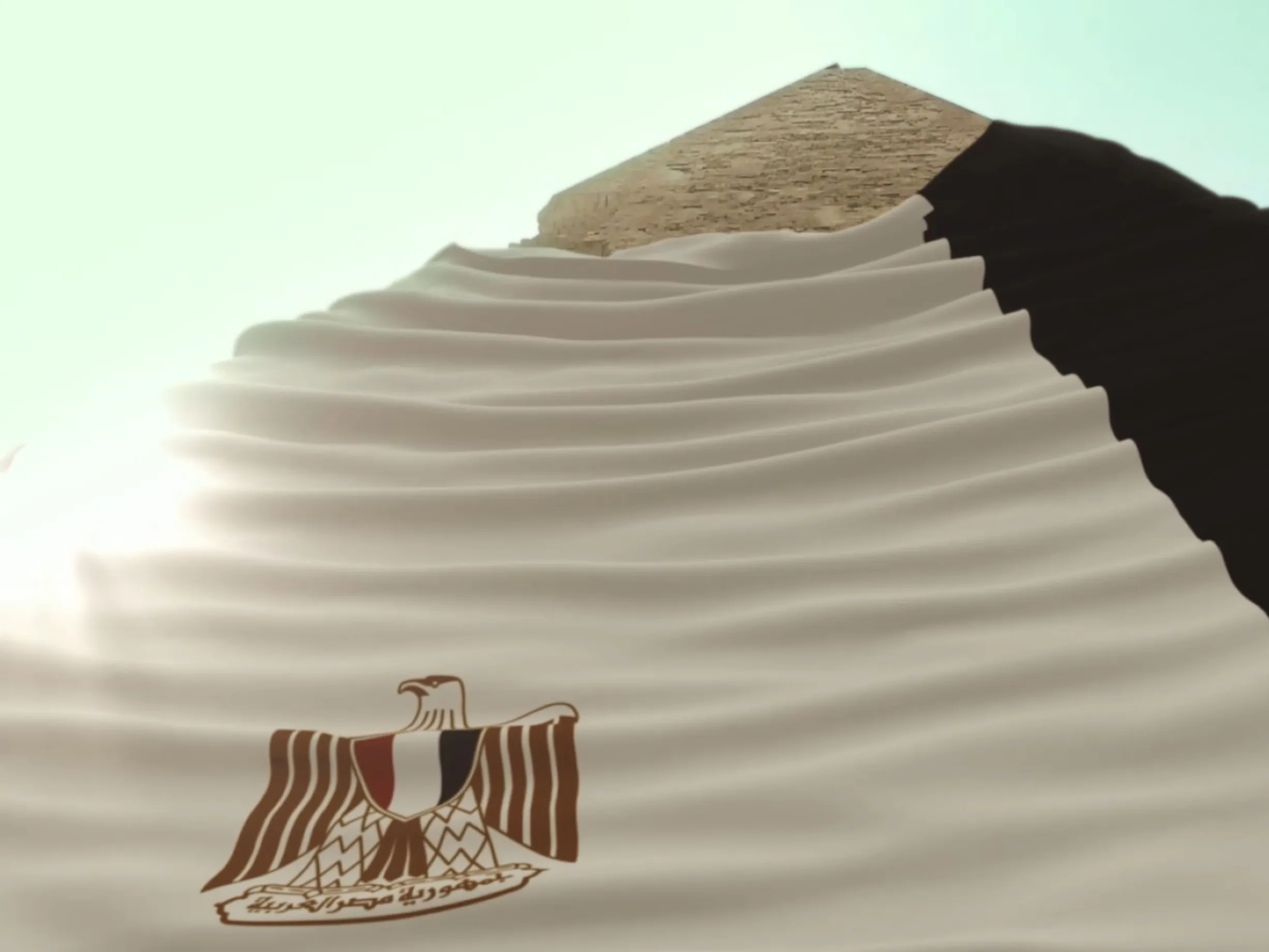 Pyramid draped with the Egyptian eagle emblem, El Dawri football promo
