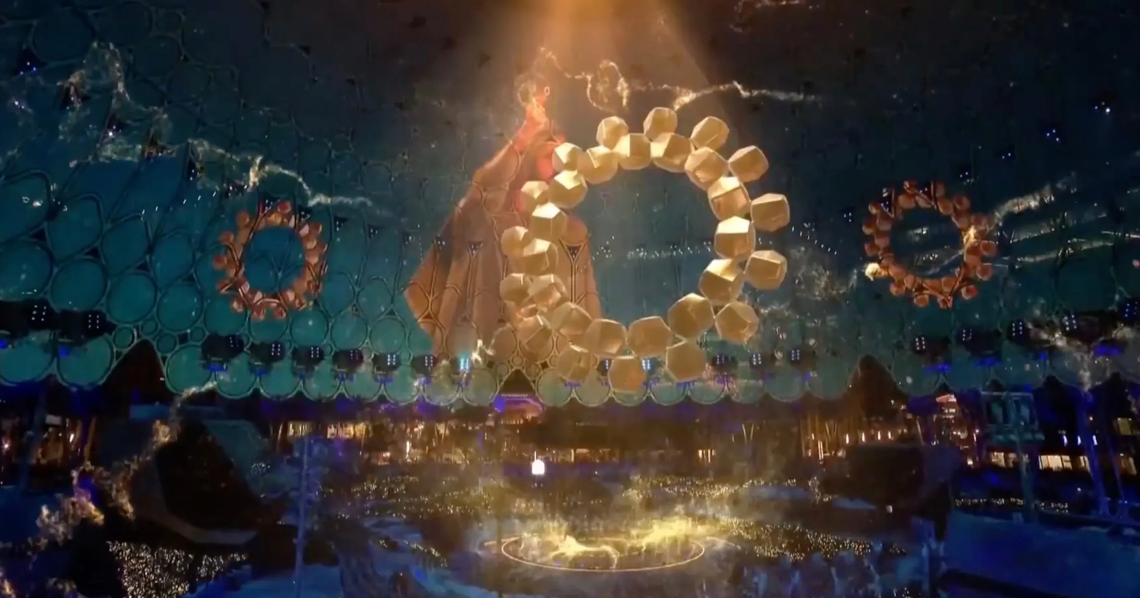Augmented-reality gold rings over the stage at the Dubai Police graduation at Al Wasl Plaza, Expo 2020 Dubai